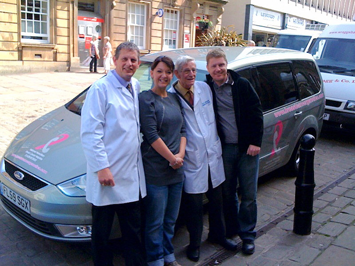 PeakFM Breakfast Show Presenters with Simon and Roy Davidson outside the shop on 4th June