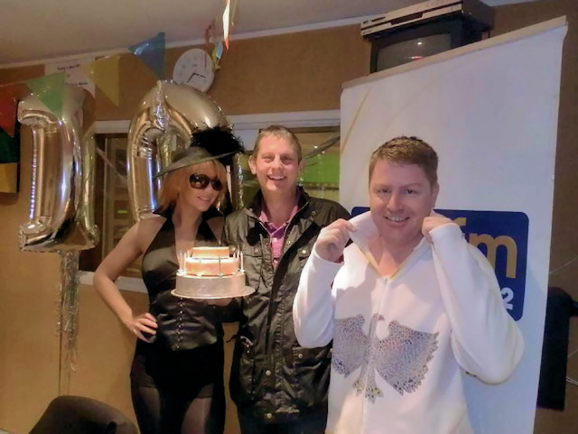 Presentation of celebration cheese cake to PeakFM for its 10th Birthday Celebration